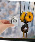 Front view of a silver cast-iron V-type groove garage door roller with mounting bracket.