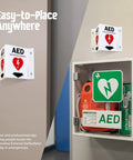Two Sided Acrylic Aed Sign Built Hard As Nails To Help You Locate Life Saving Gear Fast With Heavy Duty Polished Wall Mount Display Featuring Bold Down Arrow Symbol Indoors Outdoors, mounted on the wall near an AED cabinet.