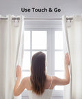Woman adjusting curtains with Smart Curtain Motor With Wireless App Control And Timers Works With Alexa Google Home And IFTTT Hub Ready For Smart Home Setup Rod20 Version White Easy No Tool Installation For Smooth Sliding.