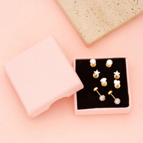 Four Pairs Hypoallergenic Flat Back Earrings For Sensitive Ears In 316L Stainless Steel Screw Back Set With CZ Balls Hearts Stars And Cute FlatBack Studs For Women Go To Everyday Wear, displayed in pink box