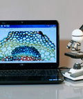 Five Magnification Levels Compound Microscope With 40X-1000X Power, 360 Degree Rotating Monocular next to a laptop display