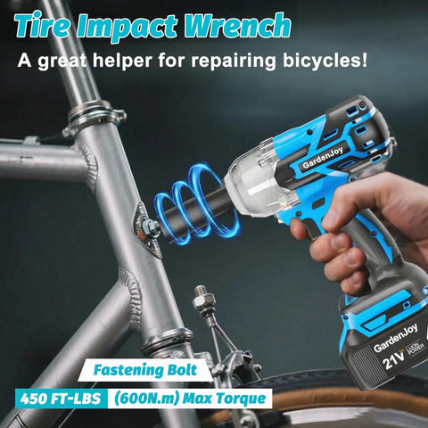 Blue cordless impact wrench with 450 Ft Lbs torque used on a bike, showing the fastening bolt; labeled 21V with 600Nm torque rating.