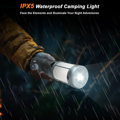 Hand holding Rechargeable Telescopic Camping Lantern With Stand And Magnetic Base 12000mAh Power Bank in rainy conditions