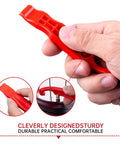 Close-up of hand holding a red Three Pack Bicycle Tire Levers For Road And Mountain Bikes Heavy Duty Self Lubricating Plastic Rim Safe Levers