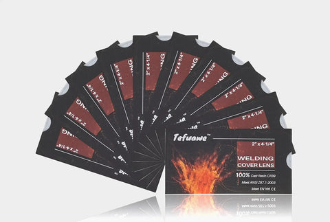 The Real Deal 100 Percent Cast Resin Replacement Lenses 10 Pack 2X4.25 Inch Clear Solar Auto Darkening Welding Filter Covers, displayed in a fan arrangement.