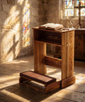 Solid Wood Prayer Bench With Shelf Comfy Cushioned Kneeler And Table Chair Rustic 23 X 20 X 32 Inches Padded Kneeler For Home Or Church Devotion Sturdy Kneeling Stool For Prayer Thoughtful Religious Gift in a church setting with a cross detail on the side and an open book on top