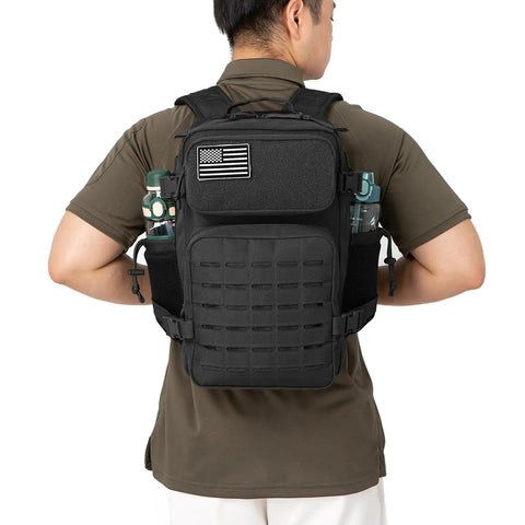 Rugged 25L Military Tactical Backpack For Everyday Carry And Bug Out Readiness With Molle Webbing Laser Cut Panels Dual Cup Holders Compact Daypack Rucksack For Men EDC Gym And Travel Black on man from back view
