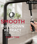 FORIOUS Kitchen Faucet with Pull Down Sprayer, Black High U-Spout showing smooth retractable spray head in use.