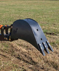 24 Inch Front And Backhoe Bucket With Hydraulic Tilt, Beefy Carbon Steel Teeth, Excavator Attachment on outdoor site