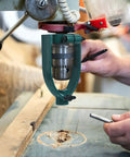 Drill Press Stand With Square Tenon Converter Drill Press Adapter For Handheld Guides And Straight Hole Drilling Portable Log Tenon Cutter 55mm Sleeve Fitting For DIY Woodworking Projects in use on workbench