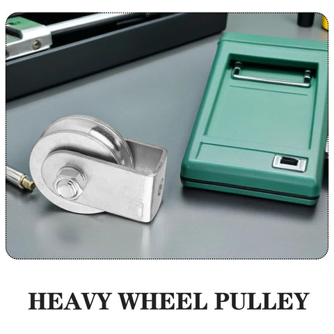 Beefed Up Heavy Duty Fixed Hoist Pulley With Single Wheel For Wire Rope Lifting And Industrial Towing Applications Steel Rigging Pulley 300 Kg Capacity Low Wear High Reliability displayed on a table beside green tool box.