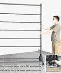Badass Heavy Duty Steel Storage Rack Built Different For Garage Organization Setup showcasing a man adjusting the wheeled display rack.