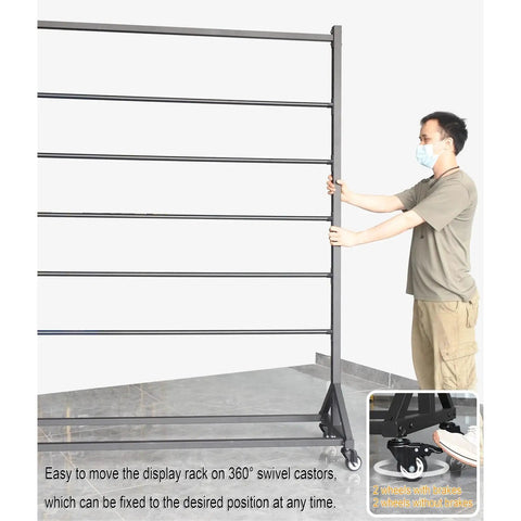 Badass Heavy Duty Steel Storage Rack Built Different For Garage Organization Setup showcasing a man adjusting the wheeled display rack.