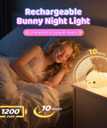 Girl sleeping with Kawaii Squishy Bunny Night Light For Kids With 16 Colors LED Glow Soft Silicone Bunny Lamp on nightstand
