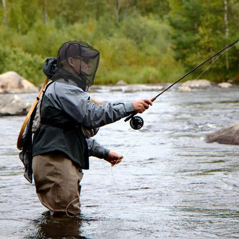 Angler wearing Premium Mosquito Head Net 2 Pack For Camping Hiking Fishing Gardening Safari Fits All Hats For Men And Women