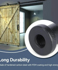 Built Tough Bottom Spacers For Sliding Barn Doors, Matte Black Wall Spacers With Door Shaft Pins, Pack Of 2 shown installed with barn door