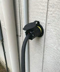 Locking NEMA L5-30R Plug Connector 30 Amp 125 Volt Two Pole Three Wire Locking Female Outlet in use on outdoor wall