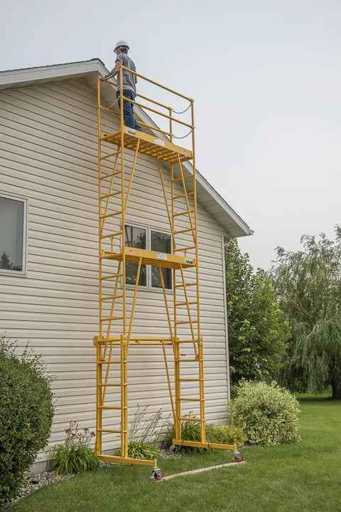 Heavy Duty Adjustable Work Platform Featuring Locked Safety Rails Acts As A Slick Scaffolding Alternative That Rolls Straight Through Standard Doorways For Tight Indoor Or Outdoor Projects Up To Eleven Feet High