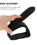 Close-up of 1 Pair Kids Bike Toe Clips And Pedal Straps Set Adjustable Footrests Anti Slip Straps Nylon Black being held by hand.