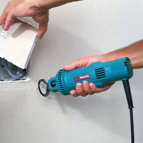 Pro Grade Drywall Cutout Tool With 5 Amp Motor And 32,000 RPM, Ultra Lightweight 2.4 Lb Spiral Saw cutting through drywall