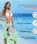 Woman on beach wearing Pool Wrap Skirt Loose Fit Ultra Lightweight Polyester Beach Ready Cover Up For Summer in medium.