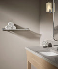 Hotelier Towel Rack With Upper Shelf And Towel Bar 24 Inch Shelf Premium Metal Construction installed in modern bathroom