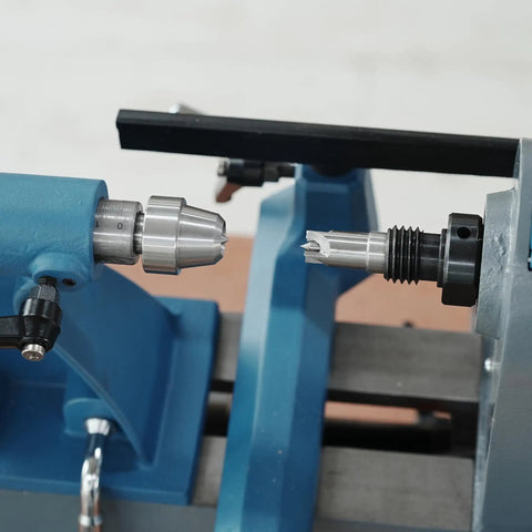 Morse Taper 2 Wood Lathe Live Center And Drive Center Set 4 Pc Cup Kit installed on blue wood lathe for turning.