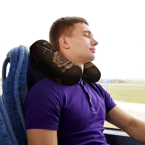 Man on bus using Rose Memory Foam Travel Neck Pillow U Shape With Zippered Cover For Planes Trains Cars And Office Naps