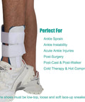 Person wearing a white Stirrup Ankle Brace Stabilizer for Sprains And Tendonitis with Gel Pads, shown with athletic shoe.