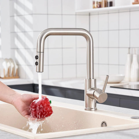 Universal Kitchen Faucet Replacement Head Pull Down Spray Nozzle With Fifteen Heavy Duty Adapters Two Function Sweet Brushed Nickel Metal Sink Sprayer Hassle Free Swap total game changer washing red vegetable in sink.