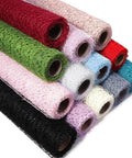 Colorful rolls of Pro Grade Flower Wrapping Mesh Paper For Bouquets, Irregular Hollow Net Wrapper, 50cm wide rolls stacked