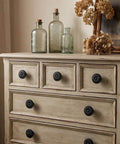 Dresser with Ten Pack Matte Black Kitchen Cabinet Knobs One And A Quarter Inch Diameter Zinc Alloy Drawer Pulls.
