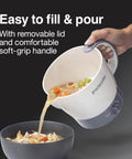 32 Oz Adjustable Temperature Electric Hot Pot Kettle For Tea Fast Boiling Water For Ramen And Noodles Great For Soup PFAS Free Nonstick Coating Easy Pour And Safe Handle White pouring soup