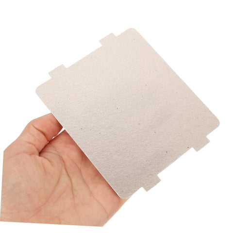 Hand holding heat resistant 10 Pack Microwave Waveguide Mica Sheets Heat Resistant Insulation Covers Fireproof Shield for Kitchen Use