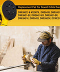 Two Pack Five Inch Eight Hole Hook And Loop Sanding Pad Replacement For DeWalt Orbital Sanders in use by worker