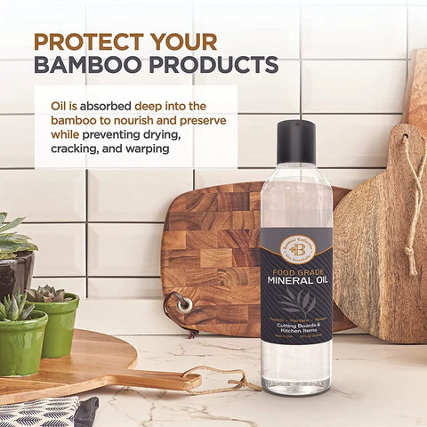 Food Grade Mineral Oil bottle on kitchen counter with cutting boards and utensils, ideal for wood conditioning and protection.