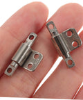 Compact Miniature Torque Damping Hinges 2 Pack shown in hand, ideal for projects like camera support frames and clamshell desk lamp doors.