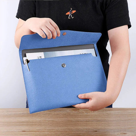 Person holding a blue Durable PU Leather A4 File Folder Waterproof Document Holder With Snap Closure