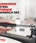 Hand using Pro Grade Bike Torque Wrench And Screwdriver Set For Your Ride Maintenance One Quarter Inch Drive Two Point Two To Sixteen Point Nine Newton Meters Includes Allen Torx Extension And Protective Case on bike parts.