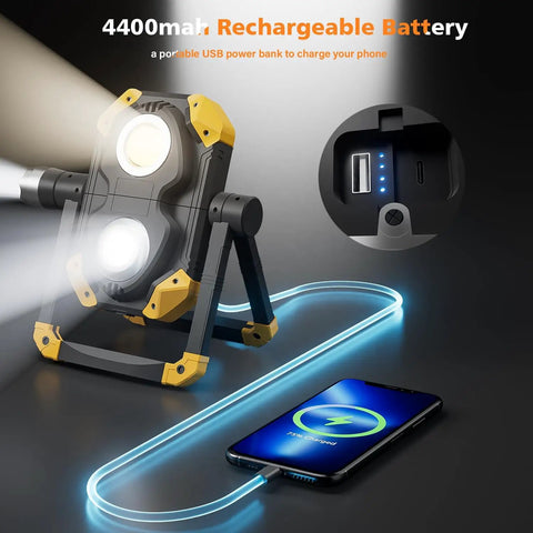 2 Pack 2500LM Magnetic Rechargeable Work Light With 360 Degree Rotating Stand And Foldable Design, shown charging a phone