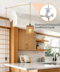 Amp Up Your Space With This Straight Up Badass Boho Pendant Light Featuring A Heavy Duty 16.5 Ft Plug In Swag Cord And Handwoven Rattan Cylinder Shade For Zero Hassle Setup And Chill Room Vibes, showcasing hanging over a kitchen island.