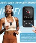 Woman running with 128GB Clip MP3 Player With Bluetooth 5.3, FM Radio, Voice Recorder on her shirt, close-up view of device screen
