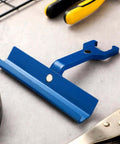 4 Inch Magnetic TDC TDF Clip Cleat Tool in blue, flat on a workbench, for PPC PPF Clips, HVAC duct work, durable sheet metal tool.