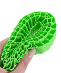 Green Silicone Rubber Insert For 118-122mm 4.75 Inch Outer Diameter RC Crawler Tires, waterproof, shown squeezed by hand.