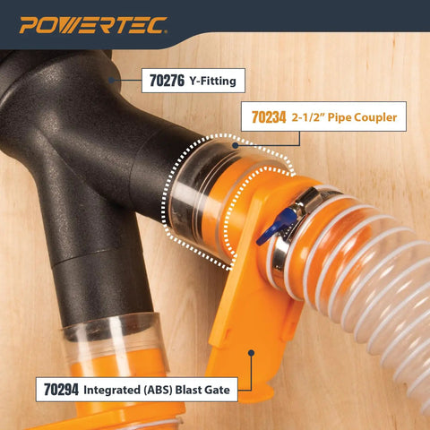 2-1/2 Inch Clear Pipe Coupling for Dust Collection System connected between a black Y-fitting and a flexible hose on a wooden surface.