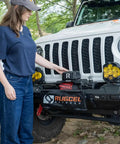 Beefy 13,500 Lb Synthetic Rope Winch For Trucks And SUVs, 12V IP68 Waterproof Motor, Wireless And Wired Remote, Heavy Duty Off Road Tow Winch For Trailers And UTVs Tank Series mounted on a Jeep front bumper