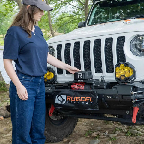 Beefy 13,500 Lb Synthetic Rope Winch For Trucks And SUVs, 12V IP68 Waterproof Motor, Wireless And Wired Remote, Heavy Duty Off Road Tow Winch For Trailers And UTVs Tank Series mounted on a Jeep front bumper