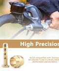 Image of a brass disc brake hose olive and barb set next to a bicycle handlebar, ideal for BH59 hydraulic disc brakes.
