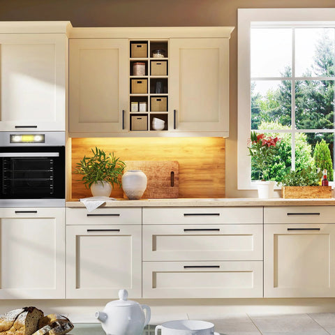 Cream kitchen cabinets with 30 Pack Solid 3-1/2 Inch Square Cabinet Handles In Oil Rubbed Bronze, showcasing replacement hardware.