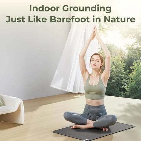 Woman meditating on Easy At Home Indoor Grounding Kit with two mats for wellness and balance